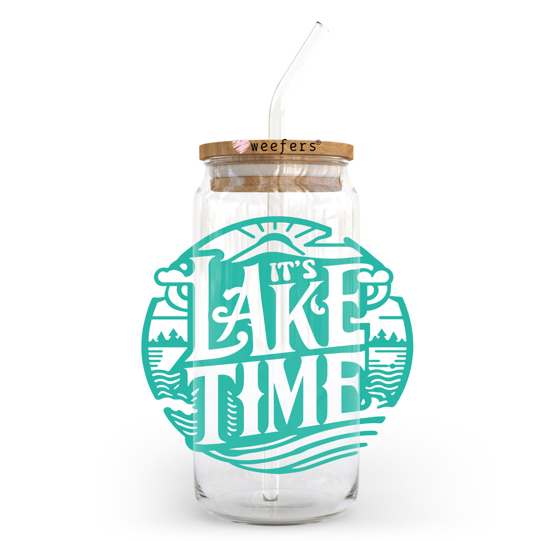 a jar with a straw in it that says it's lake time