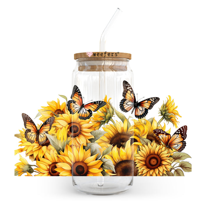 a mason jar with sunflowers and butterflies painted on it