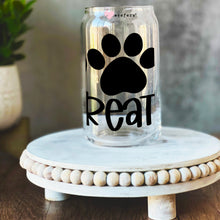 Load image into Gallery viewer, a glass jar with a paw print on it
