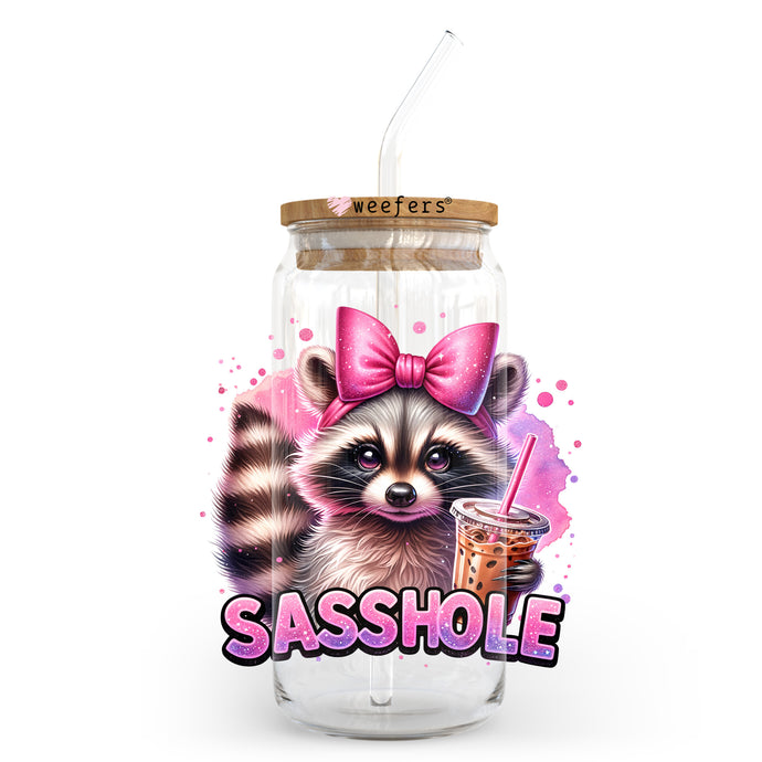 a glass jar with a picture of a raccoon in a bow holding a
