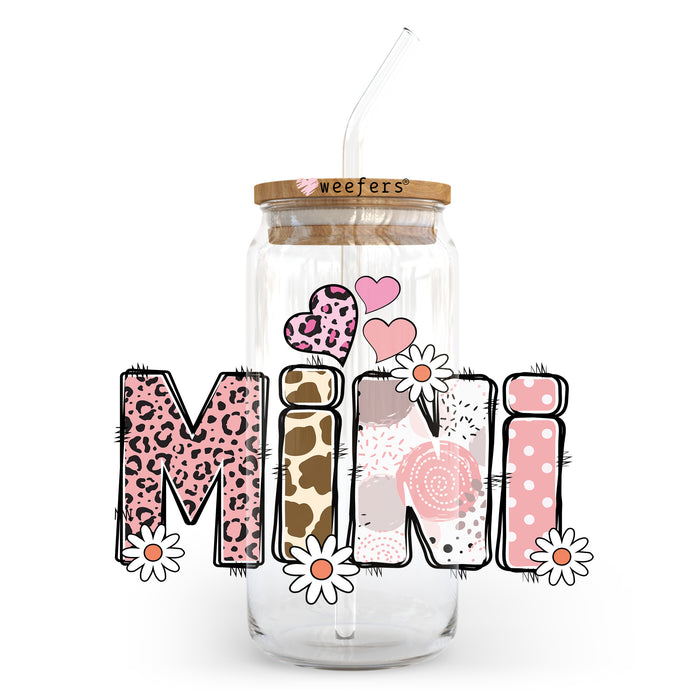 a glass jar with a straw in it with the word mimi printed on it