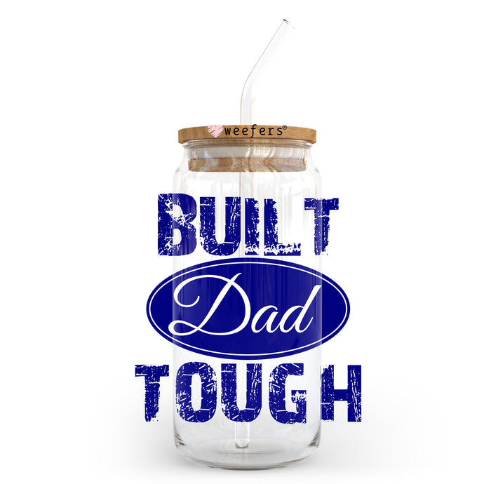 a mason jar with a straw in it that says built dad tough