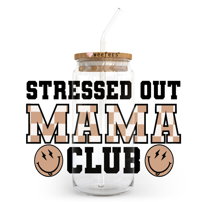 a glass jar with a straw in it that says, stressed out mama club