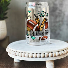 Load image into Gallery viewer, a glass jar with a football and leopard print on it
