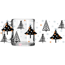 Load image into Gallery viewer, a glass mug with christmas trees on it
