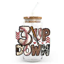Load image into Gallery viewer, a glass jar with a baseball design and a straw in it
