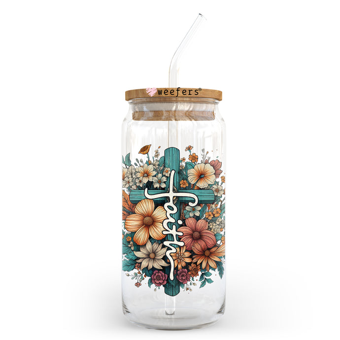 a glass jar with a cross painted on it