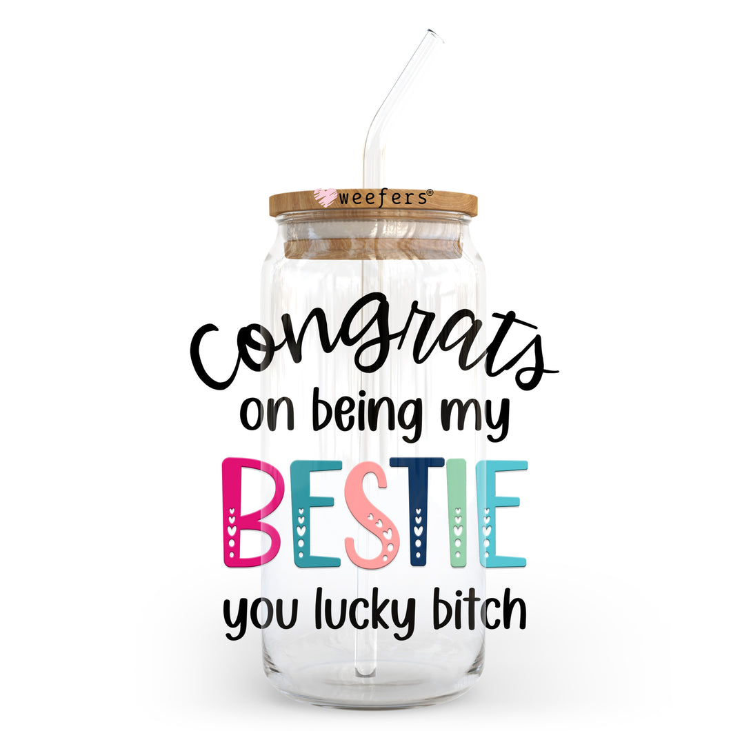 a glass jar with a straw in it that says congrats on being my