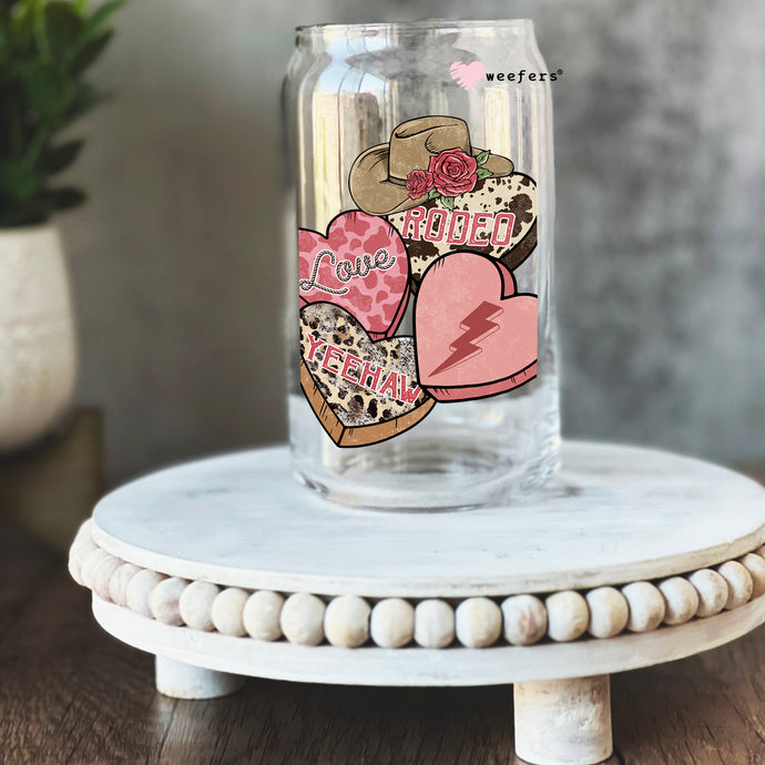 a glass jar with a picture of hearts on it