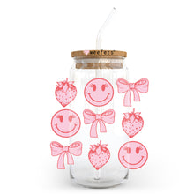 Load image into Gallery viewer, a glass jar with a straw and some stickers on it
