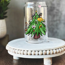 Load image into Gallery viewer, a glass with a picture of a christmas tree on it
