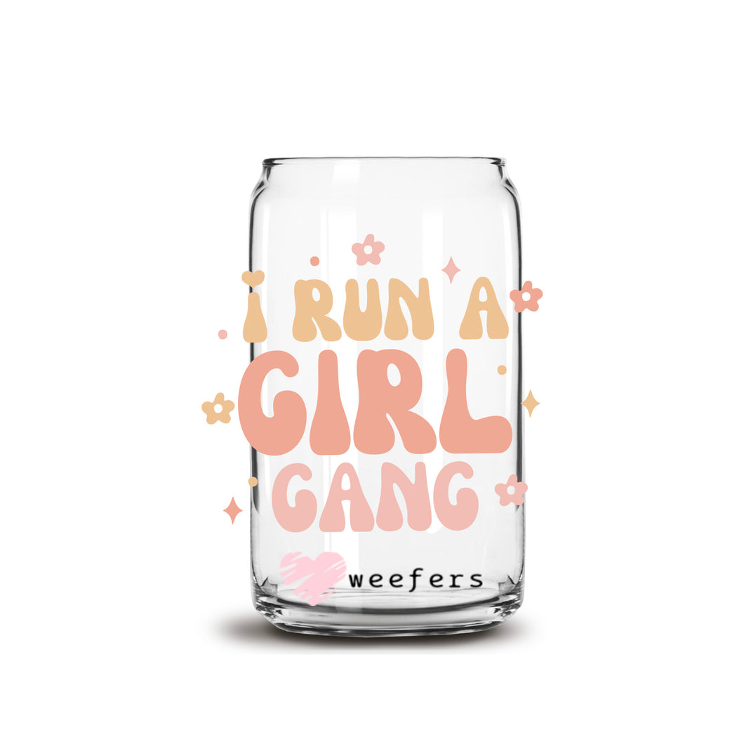 a glass jar with the words run a girl gang on it