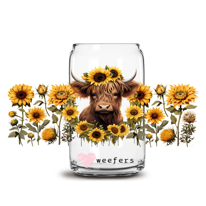 a glass jar with a picture of a cow surrounded by sunflowers