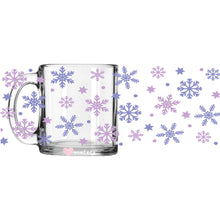 Load image into Gallery viewer, a glass mug with a snowflake pattern on it
