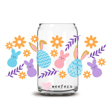 Load image into Gallery viewer, a glass jar filled with colorful easter decorations

