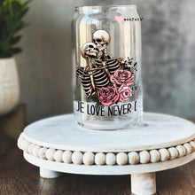 Load image into Gallery viewer, a glass jar with a skeleton and roses on it
