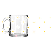 Load image into Gallery viewer, a glass mug with yellow and white flowers on it
