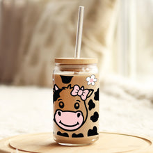 Load image into Gallery viewer, a mason jar with a straw in it with a cartoon cow on it
