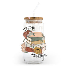 Load image into Gallery viewer, a glass jar filled with lots of books
