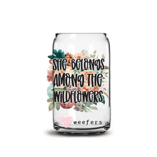 Load image into Gallery viewer, a glass jar with flowers and the words she belongs among the wildflowers
