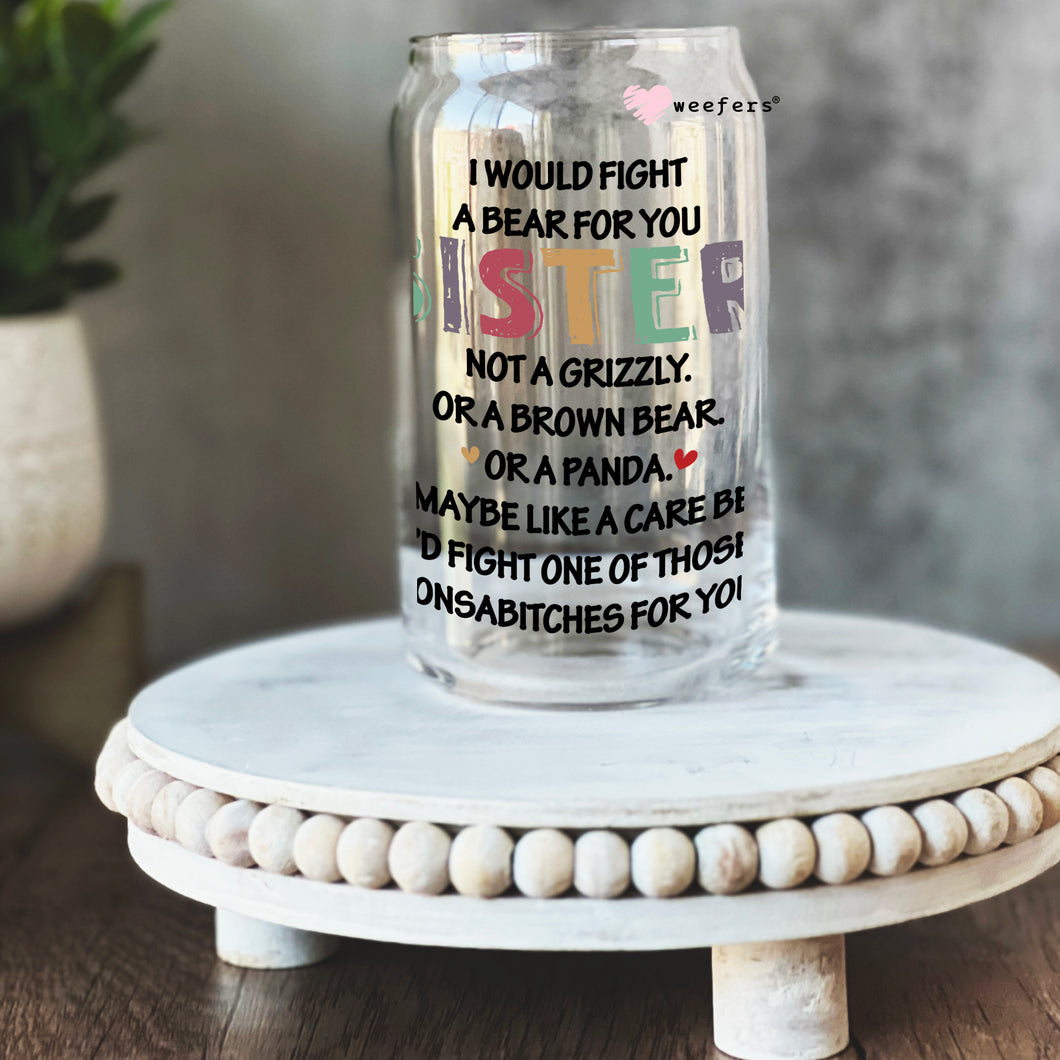 a glass jar with a quote on it