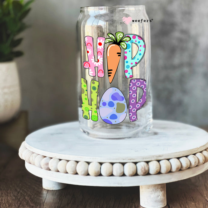 a glass jar with a carrot painted on it