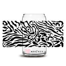 Load image into Gallery viewer, a glass with a zebra print on it
