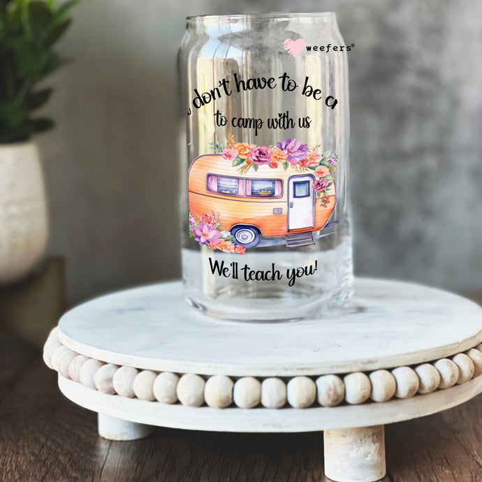a glass jar with a picture of a camper on it