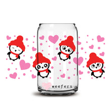 Load image into Gallery viewer, a glass jar with a picture of a penguin and hearts on it
