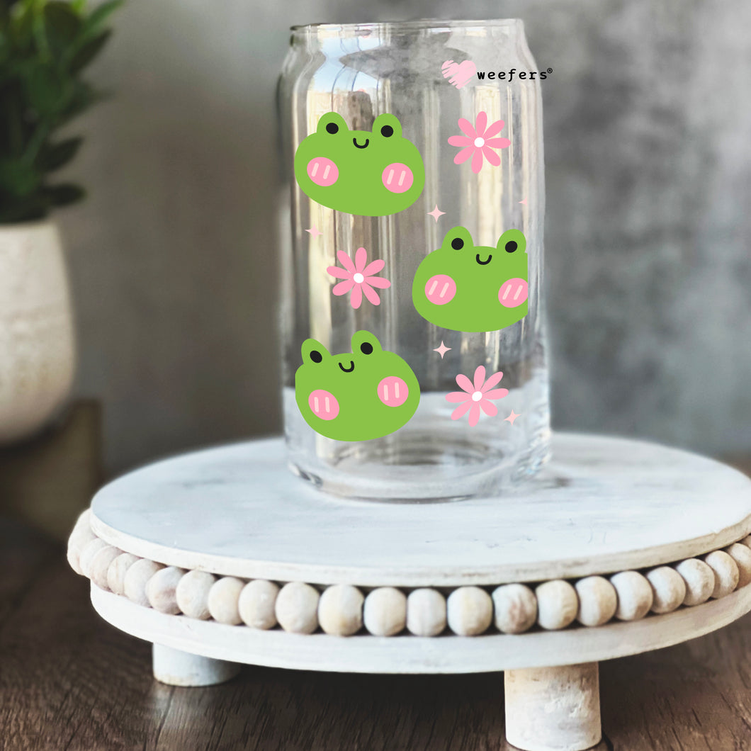 a glass jar with a sticker of a frog on it
