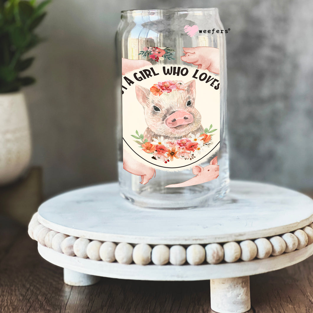 a glass bottle with a pig on it