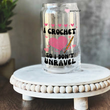 Load image into Gallery viewer, a glass jar with a crochet design on it
