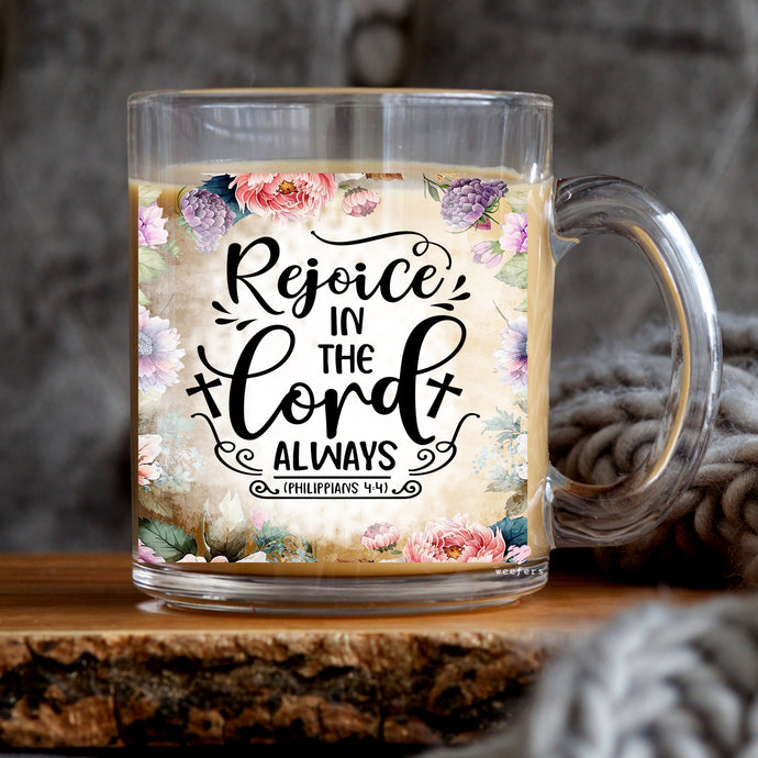 a glass mug with a quote on it