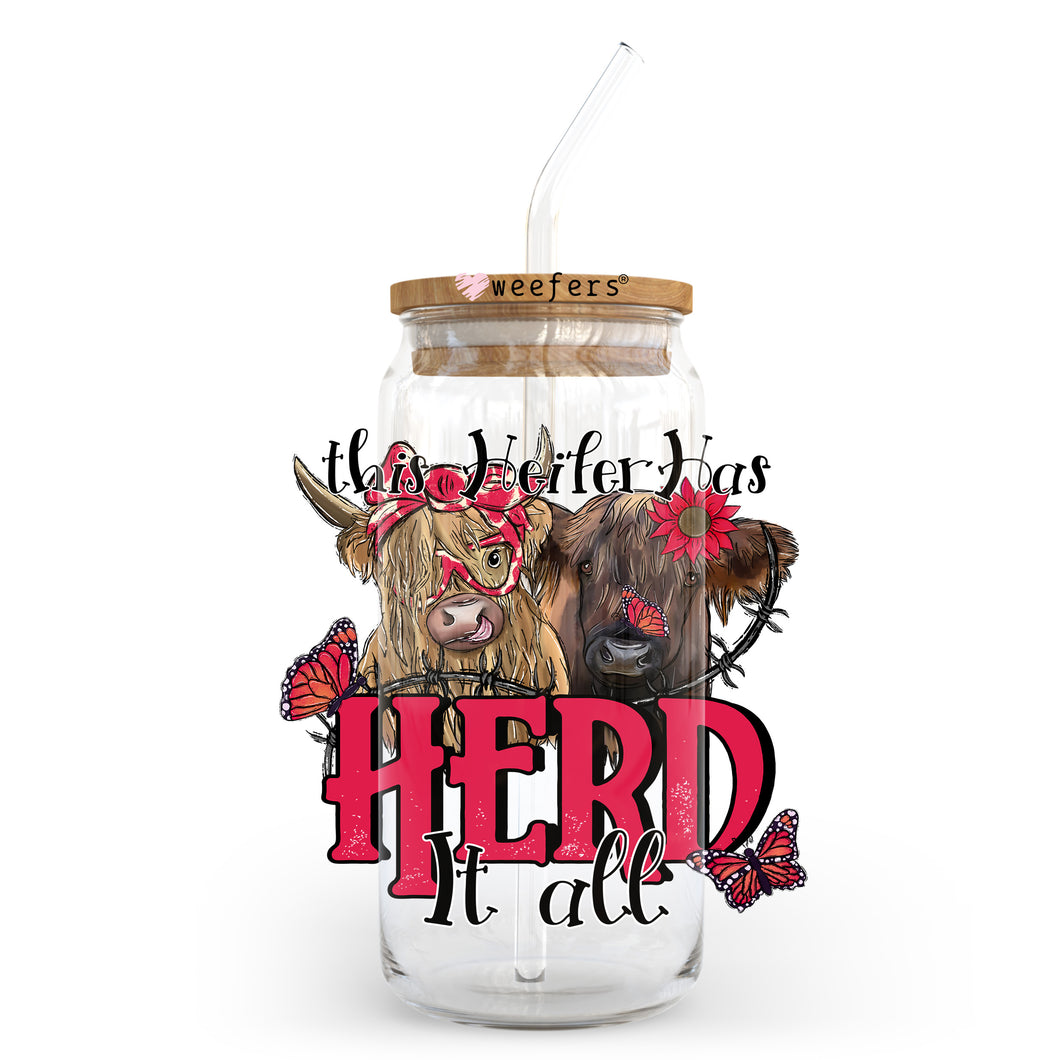a glass jar with a picture of two cows inside of it