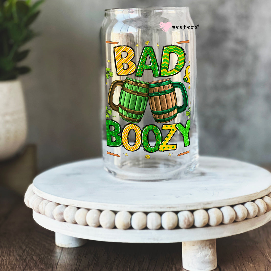 a glass jar with the words bad boozy on it
