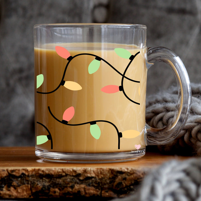a cup of coffee with a tree branch design on it