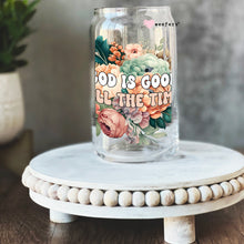 Load image into Gallery viewer, a glass jar with a floral design on it
