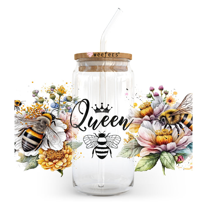 a mason jar with a straw lid and a bee on it