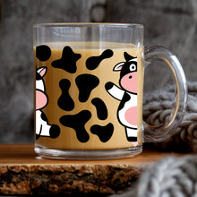 Load image into Gallery viewer, a glass mug with a cow design on it
