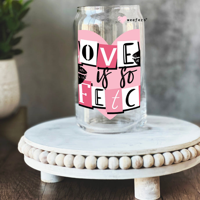 a glass jar with a pink heart on it