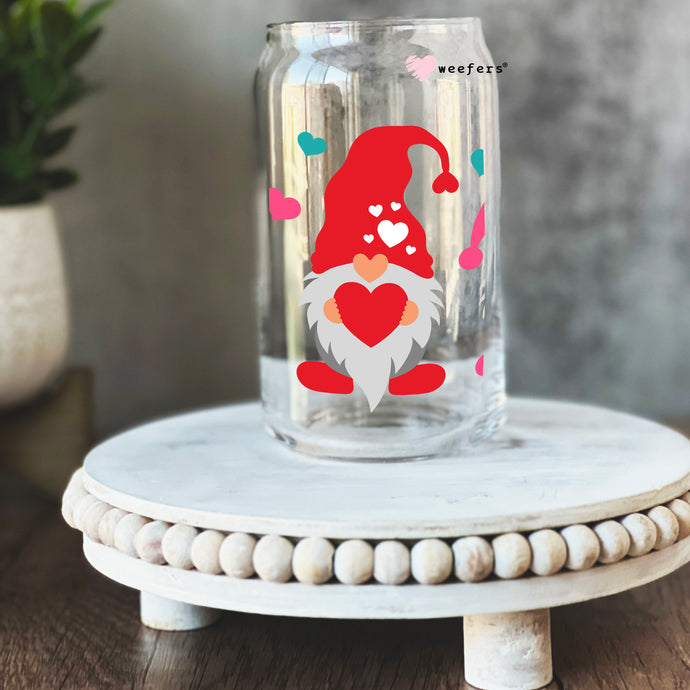 a glass jar with a picture of a gnome on it