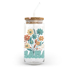 Load image into Gallery viewer, a glass jar with a straw in it with a floral design
