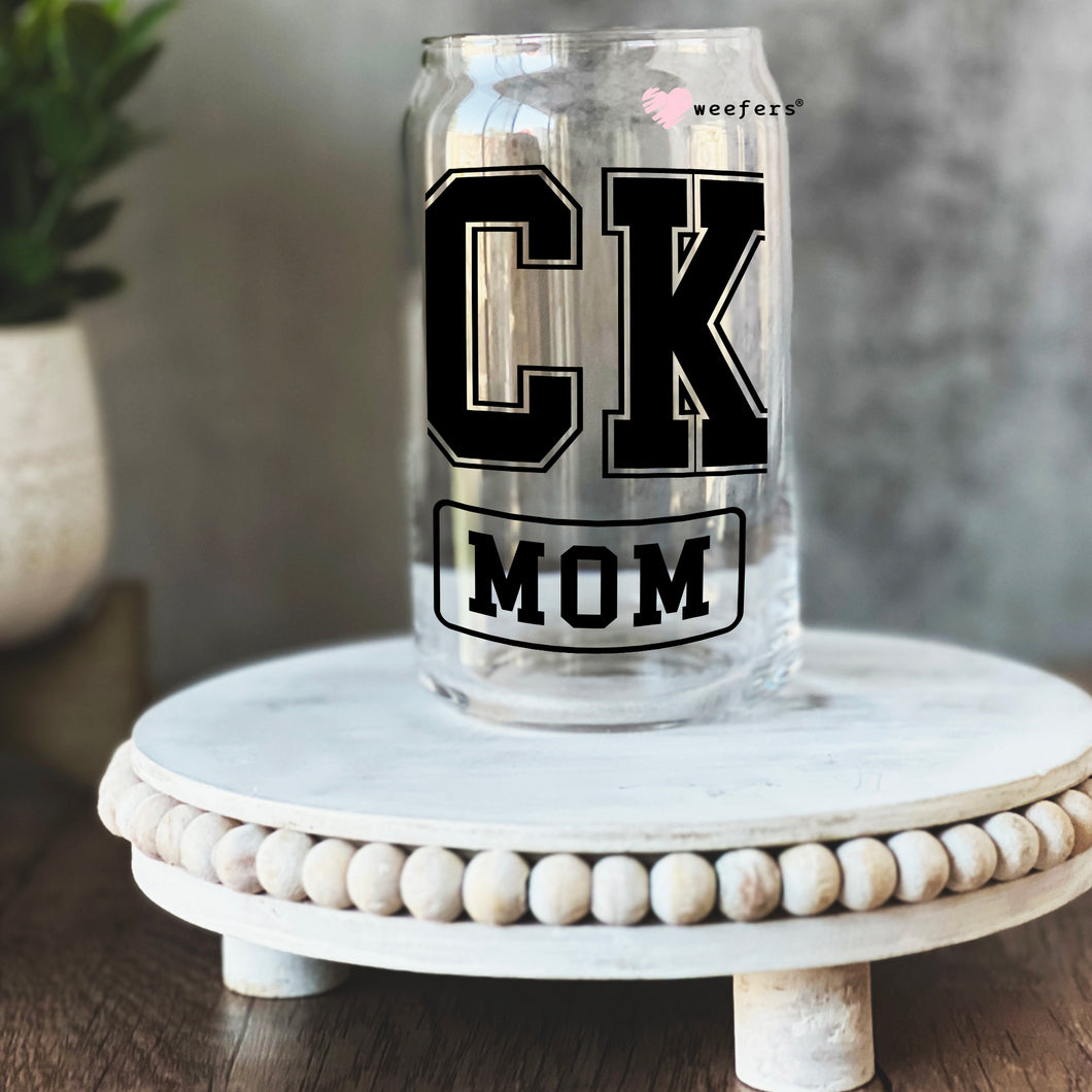 a glass jar with the word c k mom on it