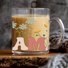 Load image into Gallery viewer, a glass mug with a flower design on it
