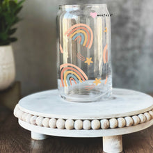 Load image into Gallery viewer, a glass jar with a rainbow painted on it
