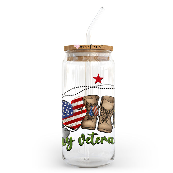 a glass jar with a straw in it with a picture of a pair of boots