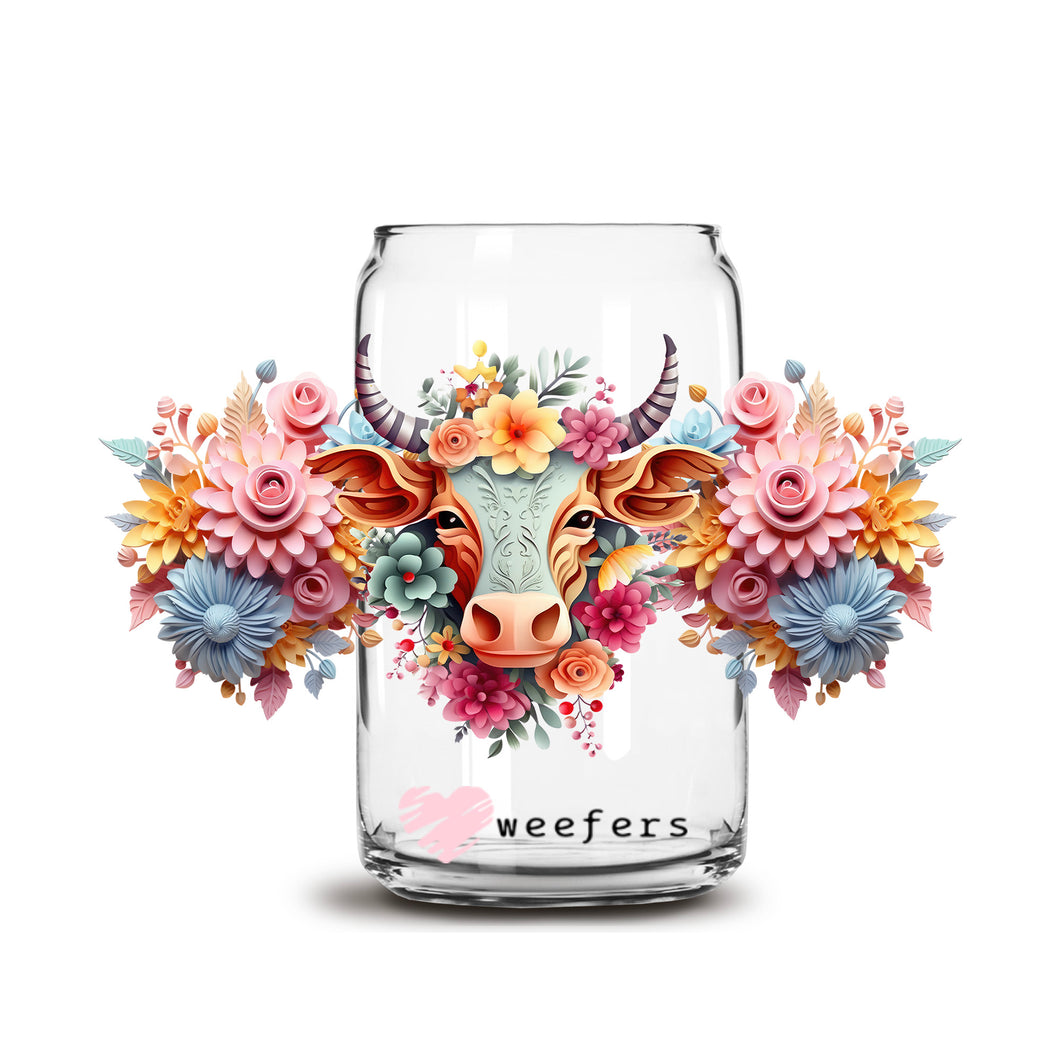 a glass jar with flowers and a cow's head on it