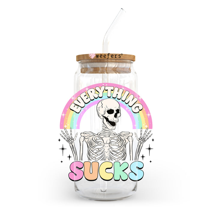 a glass jar with a skeleton inside of it