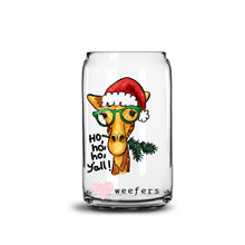Load image into Gallery viewer, a glass jar with a giraffe wearing a santa hat
