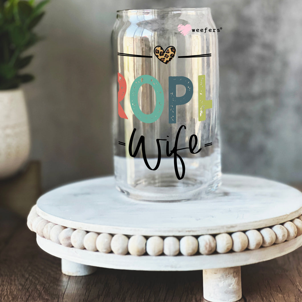 a glass jar with the words pop life on it